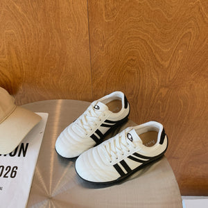 Women's versatile lightweight training sneakers in black, silver, and beige with lace-up closure
