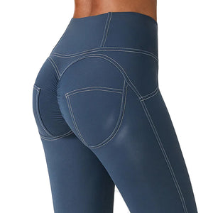 Pleated high waist sports leggings with vibrant all-over print in grey, blue, and green colors