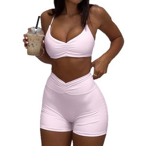 Sporty yoga-style halter top and shorts two-piece set for women in pink and yellow