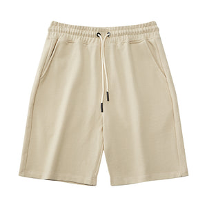 Men's heavy cotton mid-waist shorts in various colors including black, red, and blue