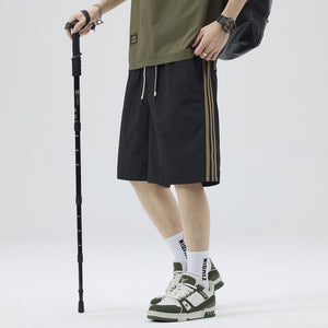 Men's quick-dry casual shorts with side ribbon stripes in black and khaki
