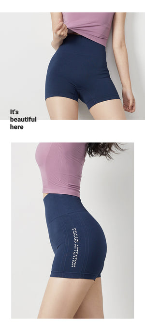 Women's tight fitting fitness yoga shorts in army green, sand pink, twilight blue, and mysterious black