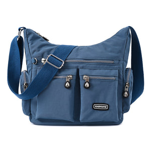 Waterproof nylon women's crossbody shoulder bag in various colors with multiple pockets