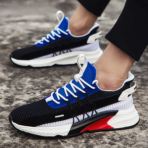 Lightweight men's walking trainers in white yellow, white red, and black blue color options