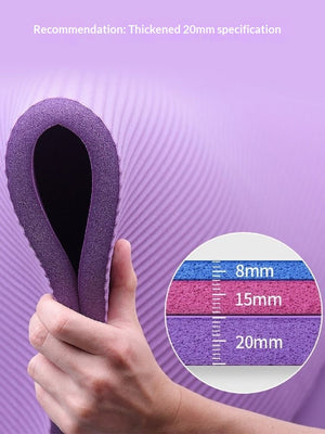 Non-slip shock-absorbing yoga mat in purple, pink, and black with free strap
