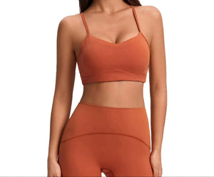 Women's push-up sports bra with thin double straps and stylish back design in various colors