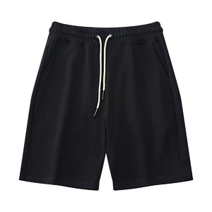 Men's heavy cotton mid-waist shorts in various colors including black, red, and blue