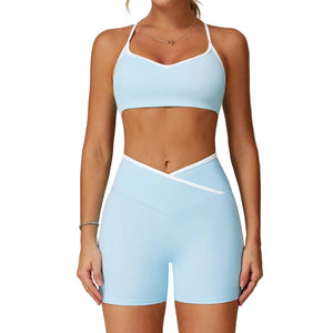 Cross high-waist sports set for women in multiple colors showing bra and shorts combination