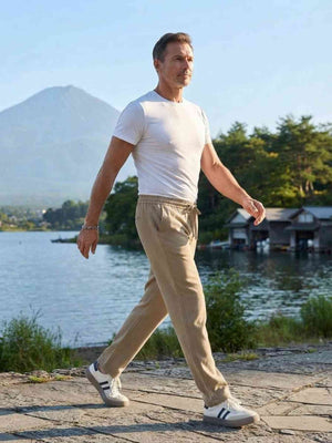 Men's stretch anti-wrinkle casual pants in black shown from multiple angles