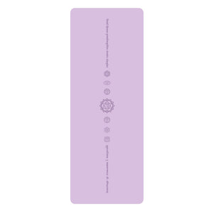 White PU leather yoga mat with natural rubber base rolled out on floor