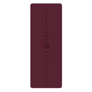 White PU leather yoga mat with natural rubber base rolled out on floor