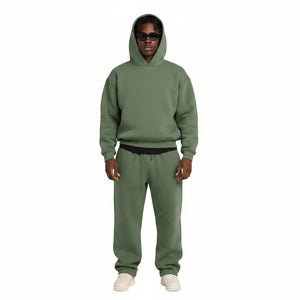 Oversized men's two-piece sportswear suit in various colors including blue, black, grey, pink, green, and dark grey