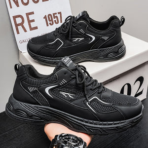 Men's breathable mesh athletic dad shoes in black and gray with thick rubber sole