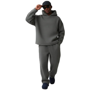 Oversized men's two-piece sportswear suit in various colors including blue, black, grey, pink, green, and dark grey