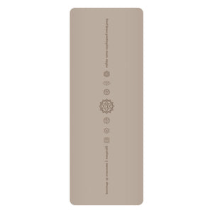 White PU leather yoga mat with natural rubber base rolled out on floor