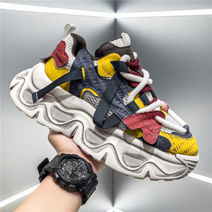 Mens breathable casual dad shoes in reddish yellow, black, and white colors