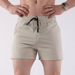 Men's American style basketball shorts in gray, black, apricot, and green colors