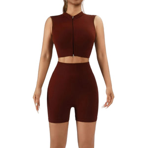 Women's 2-piece workout set with high-waisted tummy control shorts and sleeveless sports tank in multiple colors