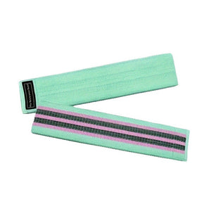 Set of 3 resistance loop bands in green, pink, and purple with carrying bag