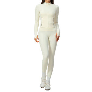 Womens figure-hugging workout two-piece set in various colors showing long sleeve top and mid-rise trousers
