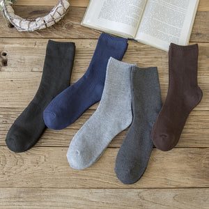 Vintage ethnic-style men's wool winter socks in assorted color block patterns