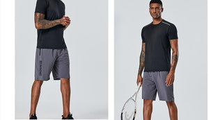 Men's quick dry nylon sports shorts in grey and black colors