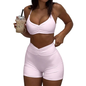 Sporty yoga-style halter top and shorts two-piece set for women in pink and yellow