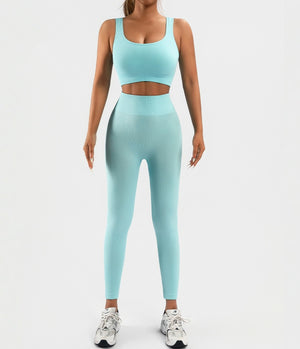 Seamless women's workout set with ribbed tank and high waist yoga shorts in multiple colors
