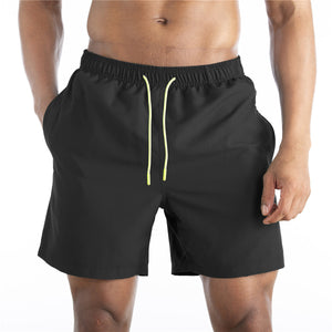 Men's cotton mid-waist beach shorts in assorted solid colors