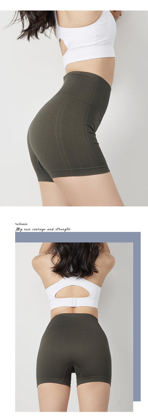 Women's tight fitting fitness yoga shorts in army green, sand pink, twilight blue, and mysterious black