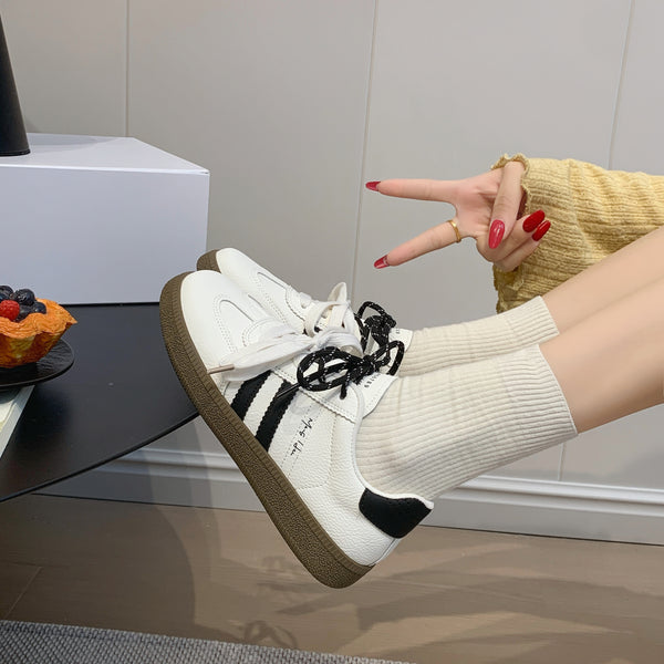 Women's casual leather running sneakers in multiple colors with rubber sole and lace-up closure