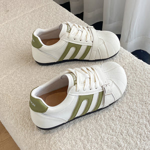 Womens German trainer casual leather sneakers in green with lace-up closure