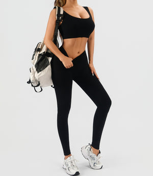 Seamless women's workout set with ribbed tank and high waist yoga shorts in multiple colors