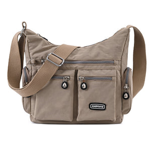 Waterproof nylon women's crossbody shoulder bag in various colors with multiple pockets