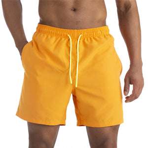 Men's cotton mid-waist beach shorts in assorted solid colors
