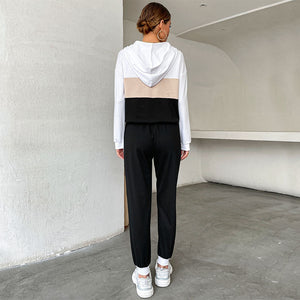 Black women's sporty hoodie and pants two-piece set with contrast color design