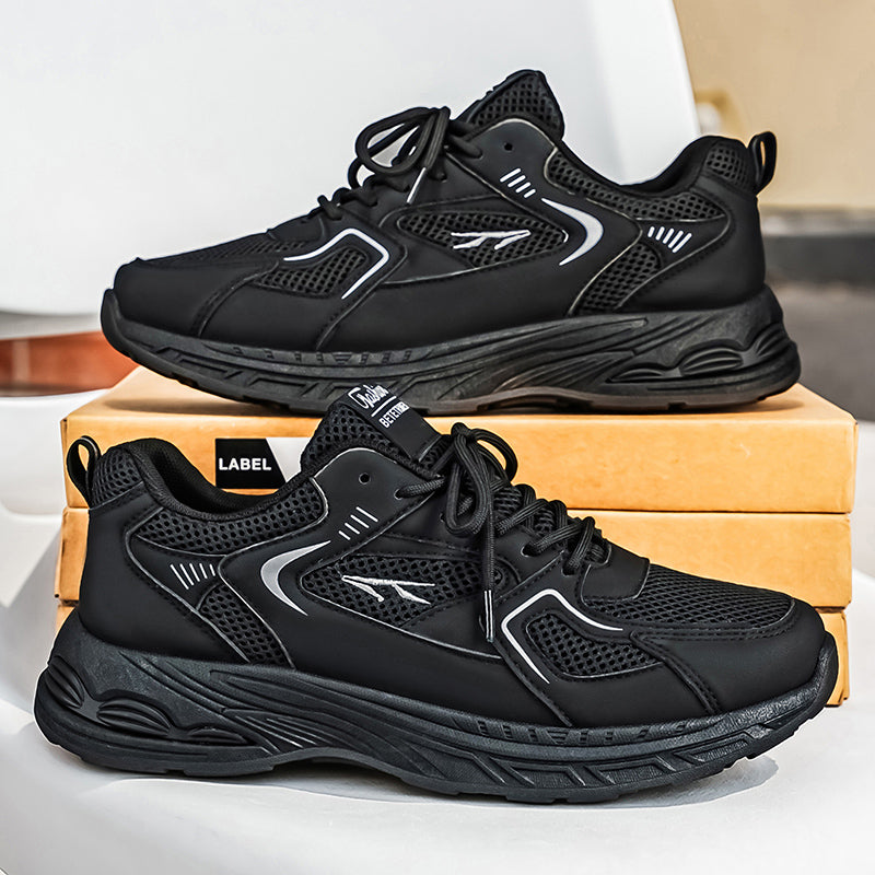 Men's breathable mesh athletic dad shoes in black and gray with thick rubber sole