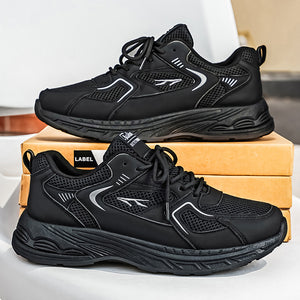 Men's breathable mesh athletic dad shoes in black and gray with thick rubber sole
