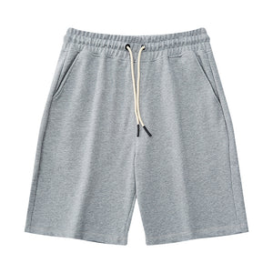 Men's heavy cotton mid-waist shorts in various colors including black, red, and blue
