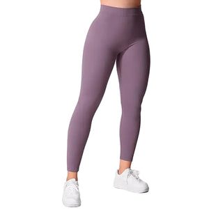 High waist hip lift sports leggings in black with side pockets and cropped fit