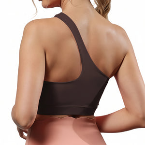 One-shoulder bare-feel sports bra in various colors with medium cup and halter neck straps