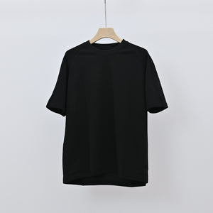Men's loose-fit patchwork t-shirt in assorted colors with short sleeves and appliqué detailing