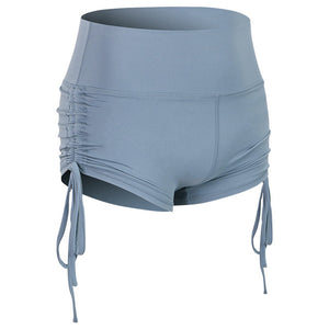 Women's side drawstring sports shorts in various colors including black, blue, green, red, grey, and purple