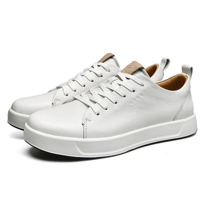 Men's casual leather sneakers in white and black with rubber sole and front lacing