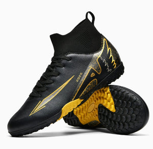Spike 15 high-top football boots in black with long studs on artificial turf