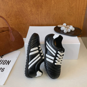 Women's versatile lightweight training sneakers in black, silver, and beige with lace-up closure