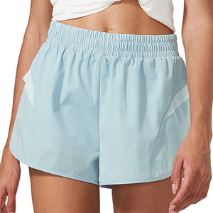 Women's loose mid waist sports shorts in black, silver powder, and moon white colors