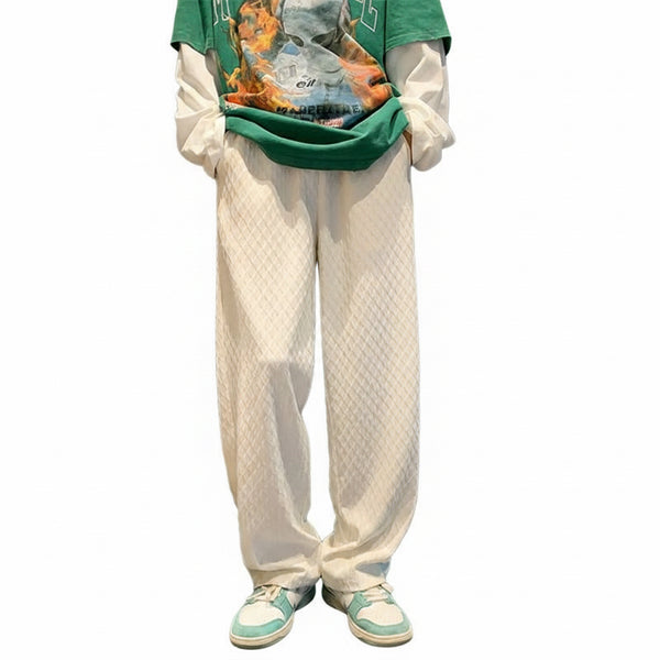 Jacquard rhombus patterned men's draped pants in white, gray, and black colors