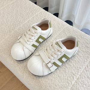 Womens German trainer casual leather sneakers in green with lace-up closure