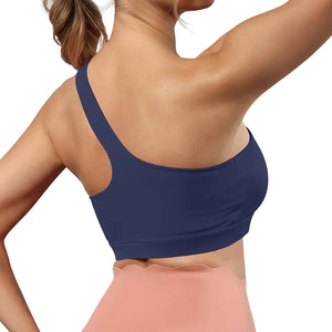 One-shoulder bare-feel sports bra in various colors with medium cup and halter neck straps